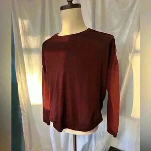 Women’s medium lightweight dressy sweater. Non smoking home.